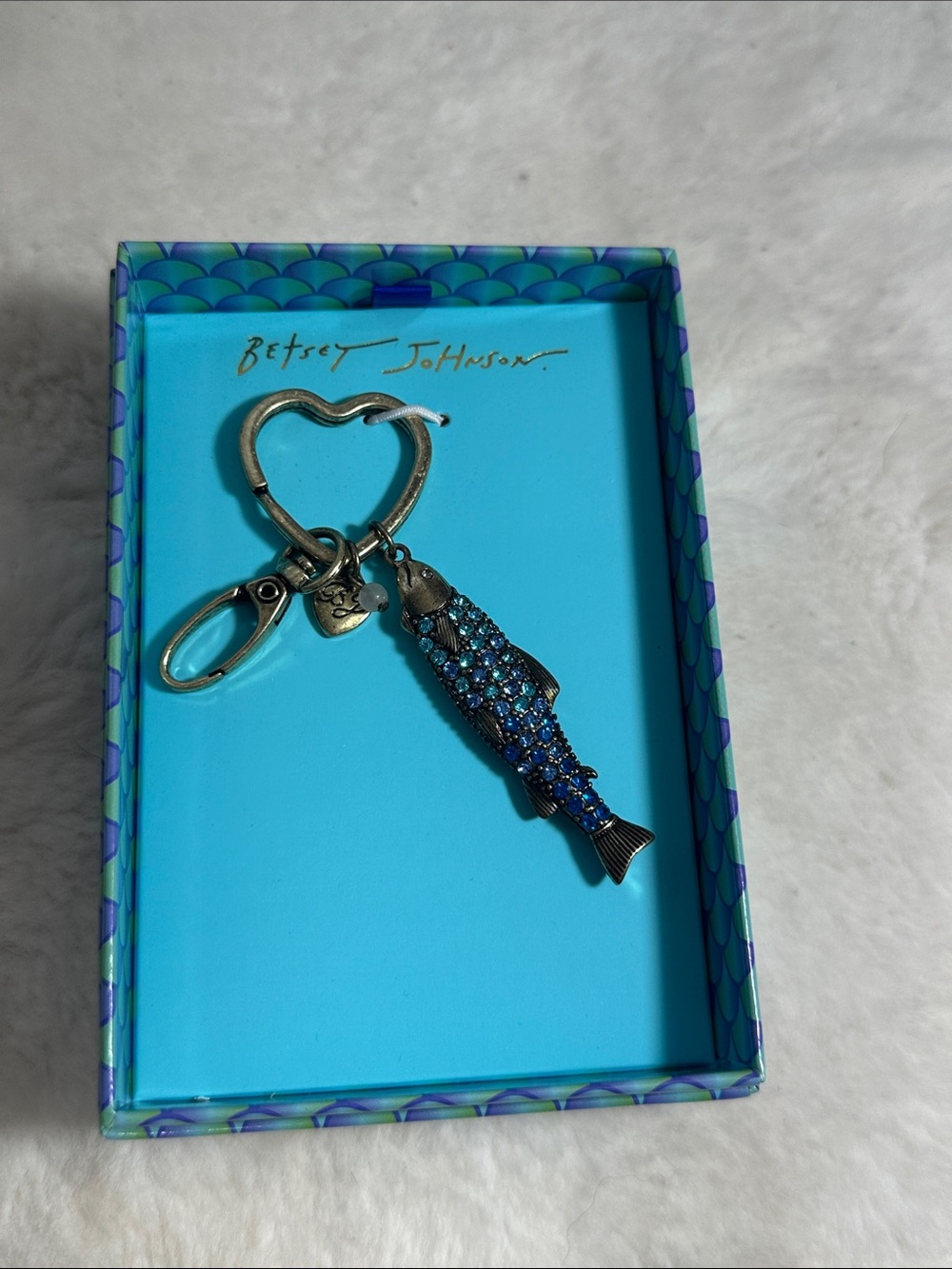 Betsey Johnson key chain with blue gemstones